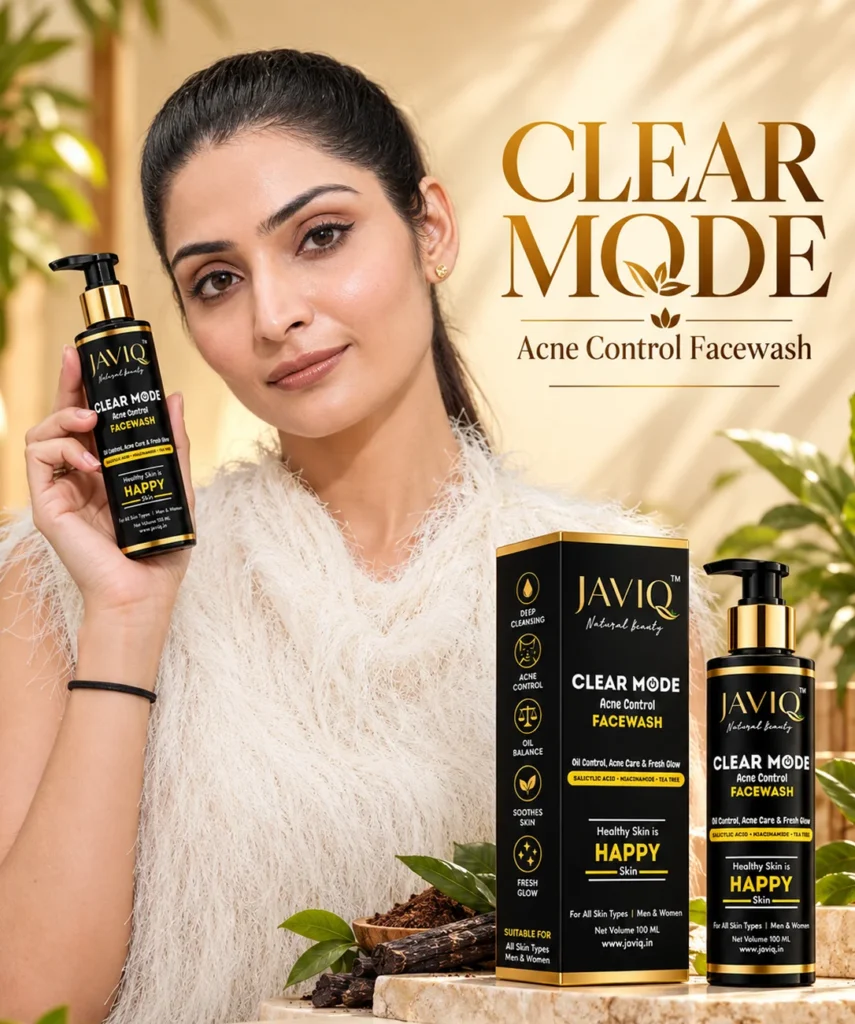 Woman holding JAVIQ Clear Mode Acne Control Face Wash, with its box and a second bottle on a stone counter