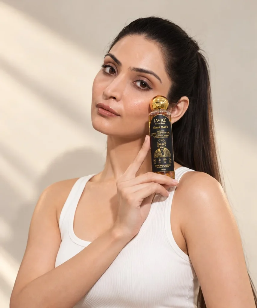 Woman holding JAVIQ Naani Maa’s Hair Growth Oil